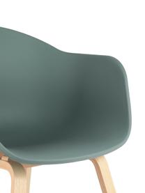 Kunststoffen armstoel Claire met houten poten, Zitvlak: kunststof, Poten: beukenhout, Grijsgroen, beukenhout, B 60 x H 54 cm