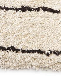 Pluizig hoogpolig vloerkleed Dunya, handgetuft, Bovenzijde: 100% polyester, Onderzijde: 100% katoen, Beige, zwart, B 160 x L 230 cm (maat M)