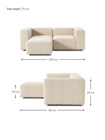 Divano componibile 3 posti in bouclé con poggiapiedi Lena, Rivestimento: bouclé (93% poliestere, 6, Rivestimento: cuscino in schiuma con an, Struttura: legno di pino, compensato, Piedini: plastica, Bouclé beige, Larg. 209 x Prof. 181 cm