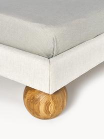Čalouněná postel s kulovými nohami z dubového dřeva Rena, Tlumeně bílá, dubové dřevo, Š 140 cm, D 200 cm