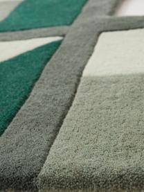 Ręcznie tuftowany dywan z wełny Agon, 100% wełna

Włókna dywanów wełnianych mogą nieznacznie rozluźniać się w pierwszych tygodniach użytkowania, co ustępuje po pewnym czasie, Odcienie zielonego, biały, S 200 x D 300 cm (Rozmiar L)