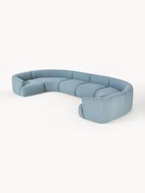 Sofá rinconera modular grande en tejido bouclé Sofia, Tapizado: tejido bouclé (100% polié, Estructura: madera de abeto, tablero , Patas: plástico Este producto es, Bouclé azul, An 450 x F 231 cm