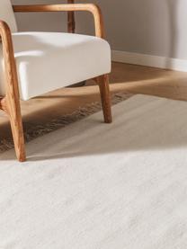 Tapis en laine tissé à la main avec franges Liv, 80 % laine, 20 % coton

Les tapis en laine peuvent perdre des fibres lors des premières semaines et des peluches peuvent se former, ce phénomène est naturel et diminue à mesure de votre usage et du temps, Beige clair, larg. 80 x long. 150 cm (taille XS)