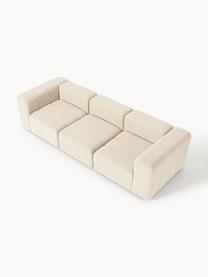 Divano componibile 4 posti in bouclé Lena, Rivestimento: bouclé (93% poliestere, 6, Struttura: legno di faggio, truciola, Piedini: plastica, Bouclé beige chiaro, Larg. 287 x Prof. 106 cm