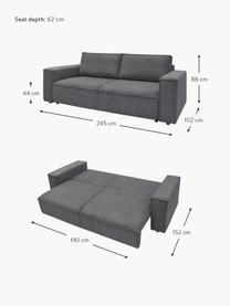 Sofa rozkładana ze sztruksu z miejscem do przechowywania Nihad (3-osobowa), Tapicerka: sztruks poliestrowy, Nogi: tworzywo sztuczne, Ciemnoszara tkanina, S 245 x G 102 cm