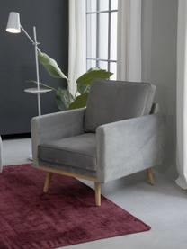 Fluwelen fauteuil Saint in grijs met eikenhouten poten, Bekleding: fluweel (polyester), Frame: massief eikenhout, spaanp, Fluweel grijs, B 85 x D 76 cm
