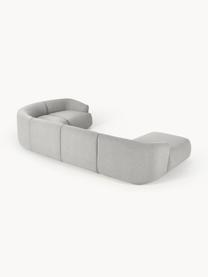 Sofá rinconera modular en tejido bouclé Sofia, Tapizado: tejido bouclé (100% polié, Estructura: madera de abeto, tablero , Patas: plástico Este producto es, Bouclé gris claro, An 404 x F 231 cm, chaise longue derecha