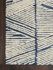 Tapis en laine tissé à la main Colorado, 100 % laine

Les tapis en laine peuvent perdre des fibres lors des premières semaines et des peluches peuvent se former, ce phénomène est naturel et diminue à mesure de votre usage et du temps, Blanc crème, bleu foncé, larg. 120 x long. 180 cm (taille S)