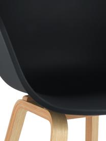 Silla con reposabrazos de plástico Claire, Asiento: plástico, Patas: madera de haya, Negro, An 60 x F 54 cm