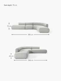 Sofá rinconera modular en tejido bouclé Sofia (4 plazas), Tapizado: tejido bouclé (100% polié, Estructura: madera de abeto, tablero , Patas: plástico Este producto es, Bouclé gris claro, An 385 x F 298 cm