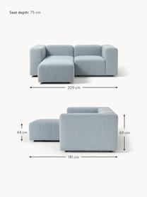 Sofá modular bouclé de 3 plazas con reposapiés Lena, Tapizado: Bouclé (93% poliéster, 6%, Estructura: madera de pino, contracha, Patas: plástico, Bouclé azul claro, An 209 x F 181 cm