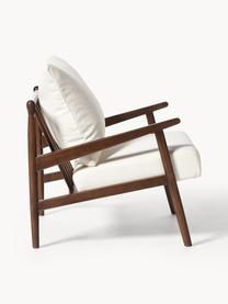 Fauteuil lounge bouclé Mikkel, En tissu bouclé blanc cassé, bois d'hévéa brun foncé laqué, larg. 66 x prof. 77 cm