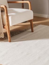 Tapis en laine tissé à la main avec franges Liv, 80 % laine, 20 % coton

Les tapis en laine peuvent perdre des fibres lors des premières semaines et des peluches peuvent se former, ce phénomène est naturel et diminue à mesure de votre usage et du temps, Beige clair, larg. 80 x long. 150 cm (taille XS)