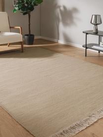 Tapis en laine tissé à la main avec franges Liv, 80 % laine, 20 % coton

Les tapis en laine peuvent perdre des fibres lors des premières semaines et des peluches peuvent se former, ce phénomène est naturel et diminue à mesure de votre usage et du temps, Beige, larg. 80 x long. 150 cm (taille XS)