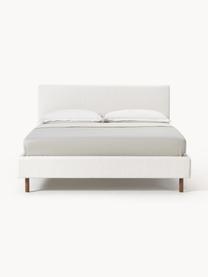 Čalúnená posteľ s drevenými nohami Giulia, Lomená biela, bukové drevo tmavohnedé lakované, Š 140 x D 200 cm