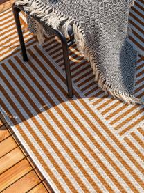 In- & outdoor vloerkleed met patroon Nillo, 100% polyethyleen, Oranje, crèmekleurig, B 120 x L 170 cm (maat S)