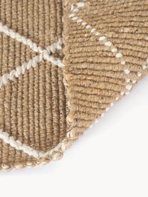 Tapis de couloir en jute fait main Kunu, 100 % jute

Au moins 50 % du textile contenu dans ce produit est composé de fibres de jute. La fibre de jute est une matière première qui se renouvelle rapidement et se caractérise notamment par une faible consommation d'eau lors de la cultivation et le traitement. En outre, ce matériau est entièrement biodégradable, Brun, blanc, larg. 80 x long. 200 cm