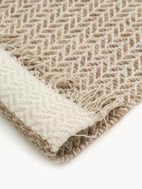 Tapis en laine à franges tissé main Kim, 80 % laine, 20 % coton

Les tapis en laine peuvent perdre des fibres lors des premières semaines et des peluches peuvent se former, ce phénomène est naturel et diminue à mesure de votre usage et du temps, Tons beiges, larg. 200 x long. 300 cm (taille L)