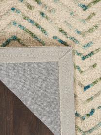 Ručně tkaný vlněný koberec se strukturovaným povrchem Colorado, 100 % vlna

V prvních týdnech používání vlněných koberců se může objevit charakteristický jev uvolňování vláken, který po několika týdnech používání ustane., Krémově bílá, odstíny zelené, odstíny modré, Š 160 cm, D 220 cm (velikost M)