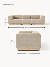 Modulares Sofa Natalie (3-Sitzer) aus Teddy-Bouclé, Bezug: Teddy-Bouclé (100 % Polye, Gestell: mitteldichte Holzfaserpla, Sockel: Massives Buchenholz, lack, Teddy-Bouclé Beige, helles Buchenholz, B 283 x T 107 cm