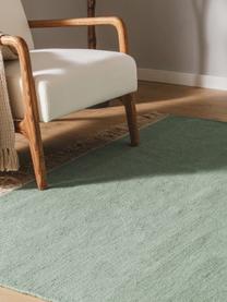 Ręcznie tkany dywan z wełny Liv, 80% wełna, 20% bawełna

Włókna dywanów wełnianych mogą nieznacznie rozluźniać się w pierwszych tygodniach użytkowania, co ustępuje po pewnym czasie, Szałwiowy zielony, S 80 x D 150 cm (Rozmiar XS)
