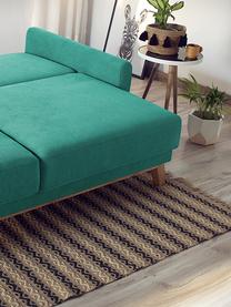 Divano letto 3 posti in velluto con contenitore Balio, Rivestimento: 100% velluto di poliester, Piedini: Legno, Tessuto verde smeraldo, legno di faggio, legno chiaro, Larg. 216 x Alt. 102 cm