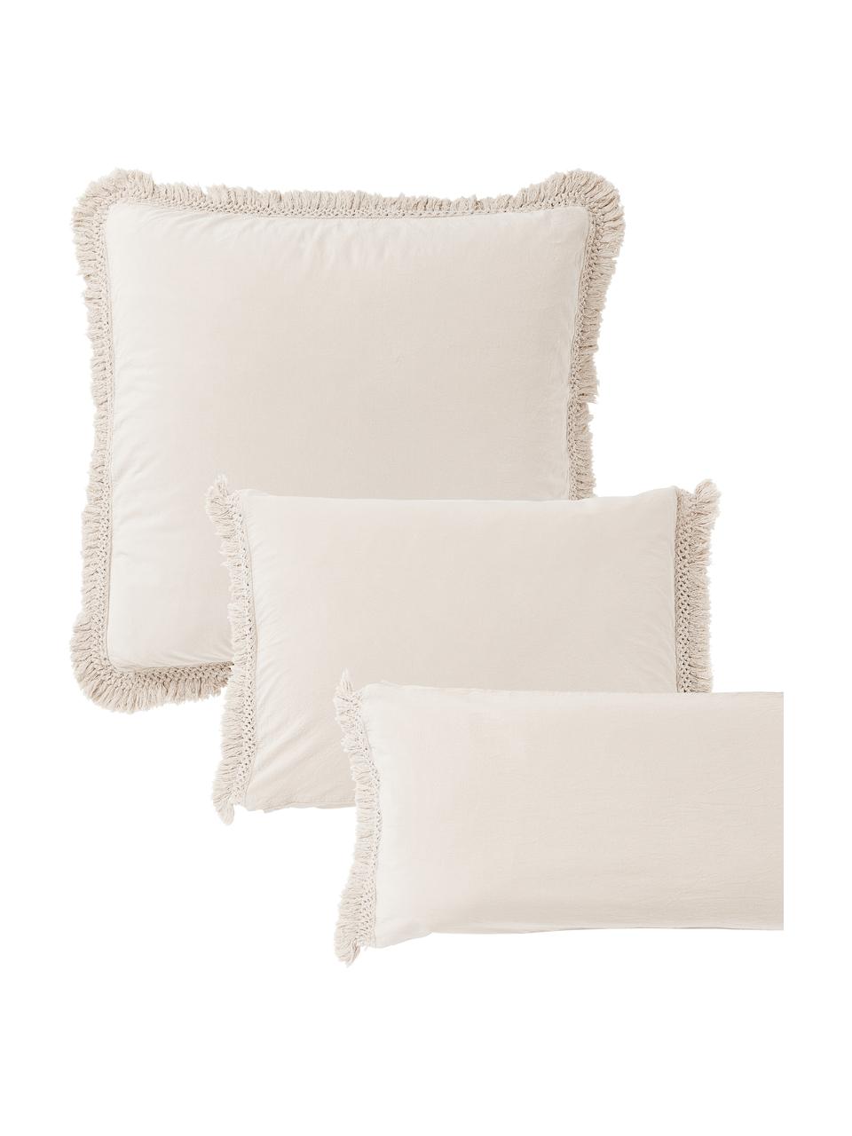 Taie d'oreiller en coton délavé à franges Abra, 100 % coton
Densité 165 fils par pouce carré, qualité standard

La literie en coton procure une agréable sensation de douceur sur la peau, absorbe bien l'humidité et convient aux personnes allergiques

Le matériau est certifié STANDARD 100 OEKO-TEX®, 10817CIT, CITEVE, Beige, larg. 50 x long. 70 cm