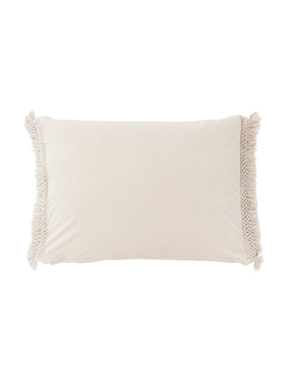 Taie d'oreiller en coton délavé à franges Abra, 100 % coton
Densité 165 fils par pouce carré, qualité standard

La literie en coton procure une agréable sensation de douceur sur la peau, absorbe bien l'humidité et convient aux personnes allergiques

Le matériau est certifié STANDARD 100 OEKO-TEX®, 10817CIT, CITEVE, Beige, larg. 50 x long. 70 cm