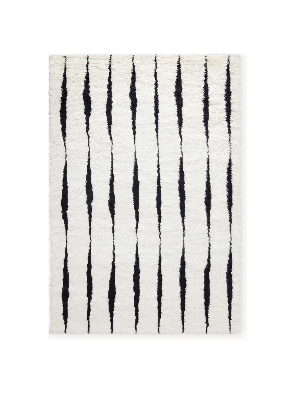 Tapis en laine tissé à la main Fjord, 100 % laine

Les tapis en laine peuvent perdre des fibres lors des premières semaines et des peluches peuvent se former, ce phénomène est naturel et diminue à mesure de votre usage et du temps, Blanc cassé, noir, larg. 140 x long. 200 cm (taille S)