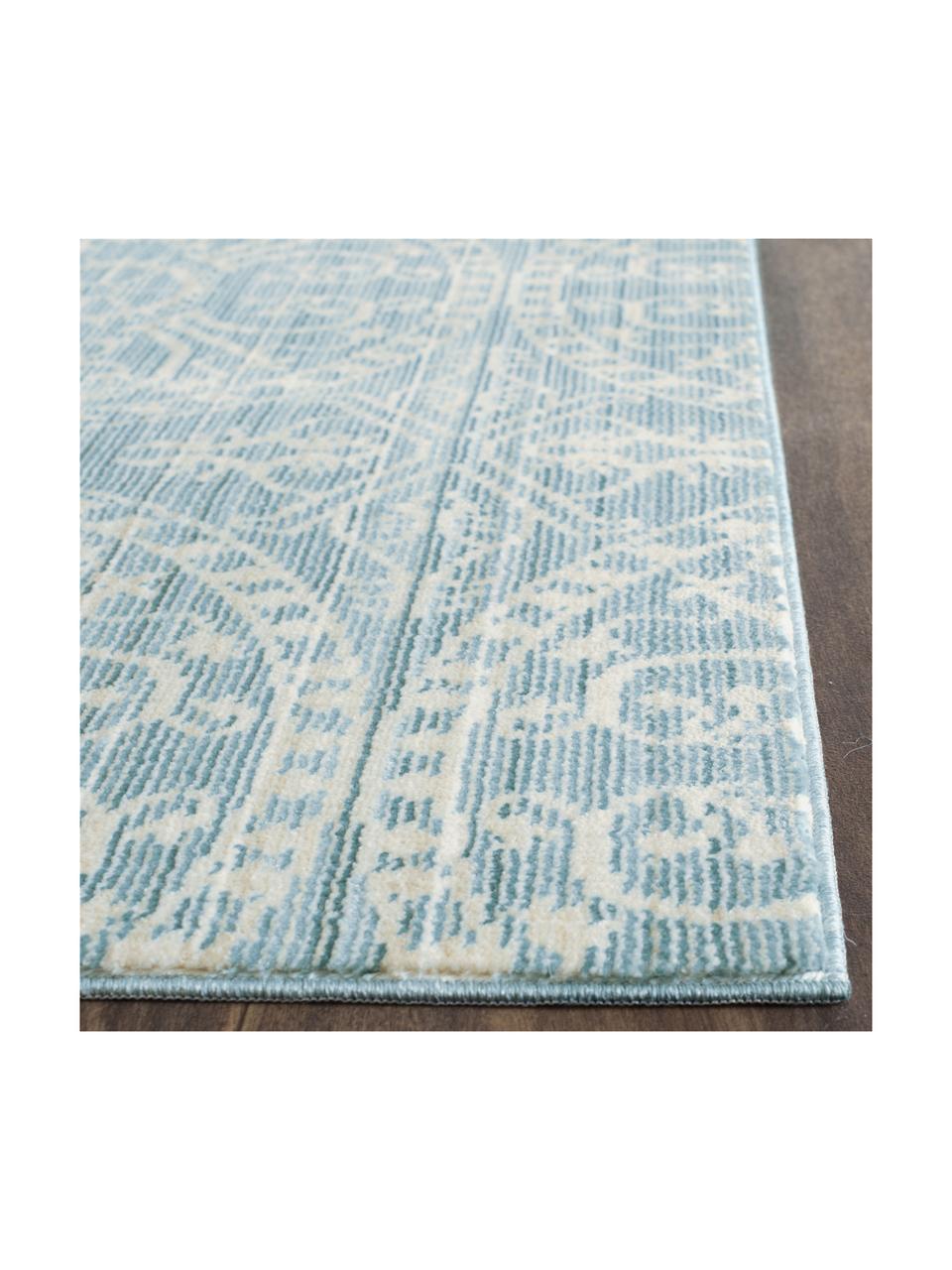 Vloerkleed Taryn, Bovenzijde: 100% polyester, Onderzijde: 100% polyester, Turquoise, crèmekleurig, 152 x 243 cm