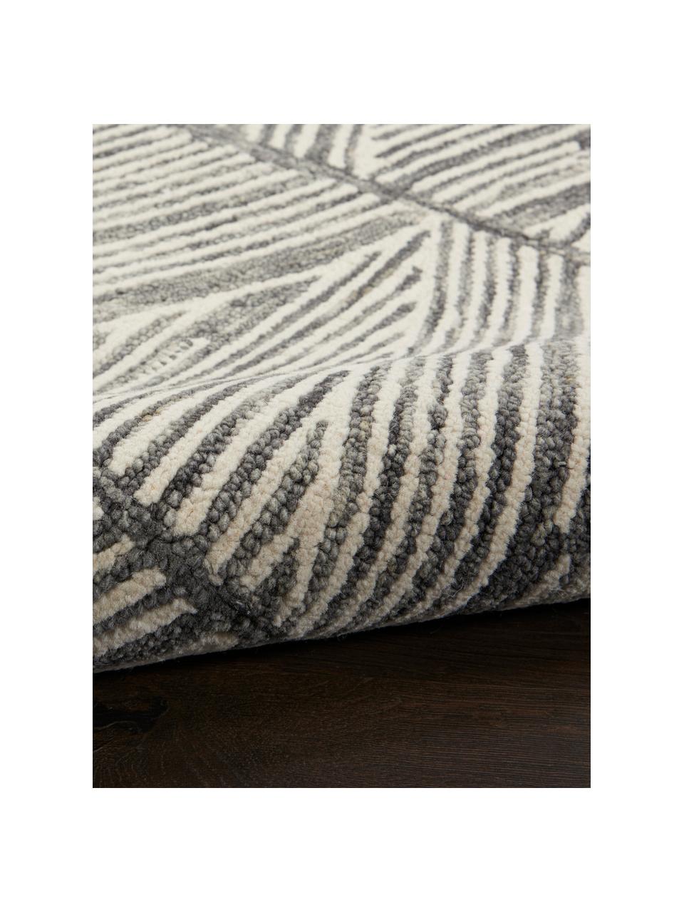 Ręcznie tkany dywan z wełny Colorado, 100% wełna

Włókna dywanów wełnianych mogą nieznacznie rozluźniać się w pierwszych tygodniach użytkowania, co ustępuje po pewnym czasie, Kremowobiały, ciemny szary, S 120 x D 180 cm (Rozmiar S)