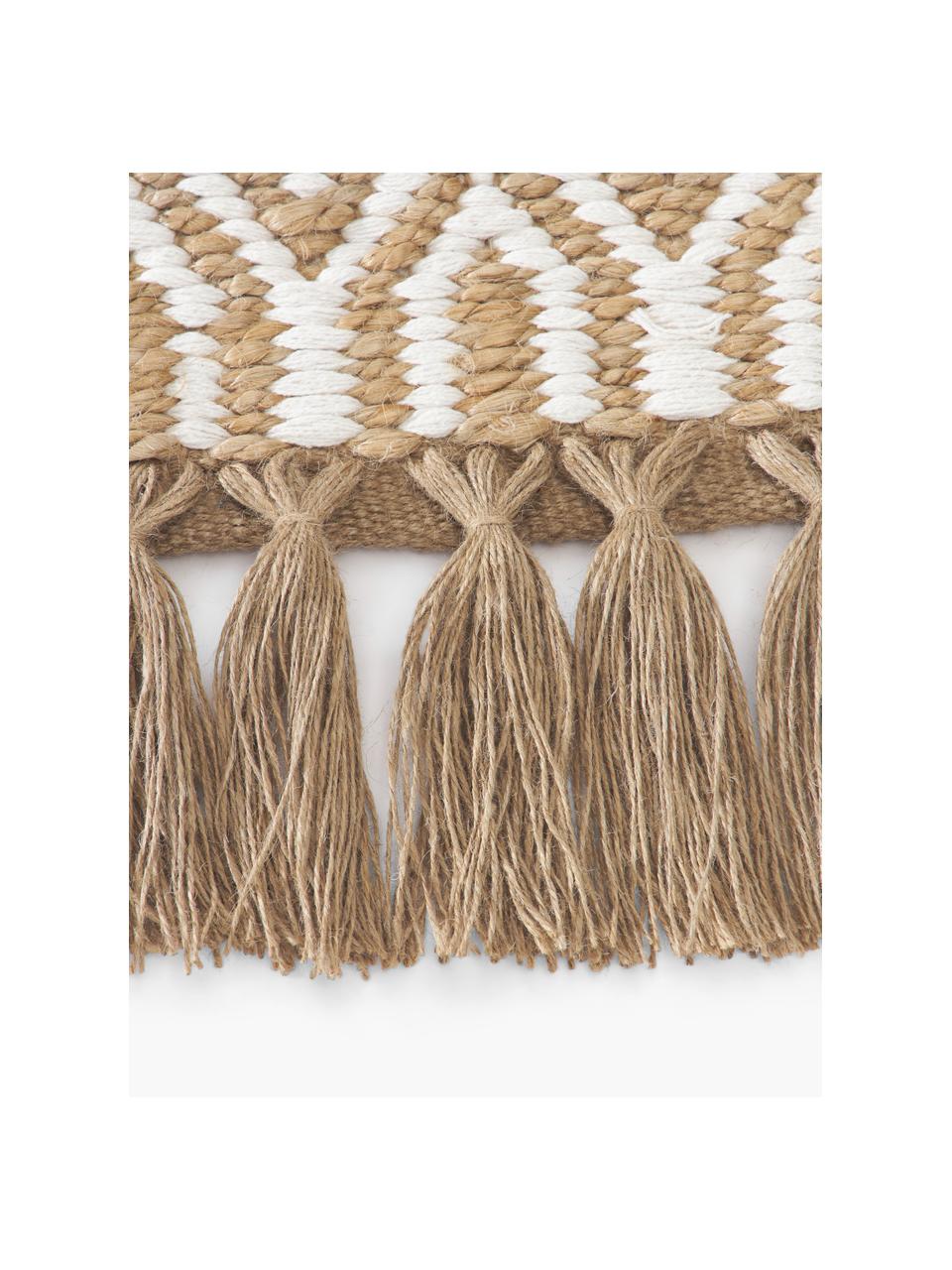Tapis de couloir en jute fait main Ramos, 100 % jute

Au moins 50 % du textile contenu dans ce produit est composé de fibres de jute. La fibre de jute est une matière première qui se renouvelle rapidement et se caractérise notamment par une faible consommation d'eau lors de la cultivation et le traitement. En outre, ce matériau est entièrement biodégradable, Brun, blanc, larg. 80 x long. 200 cm