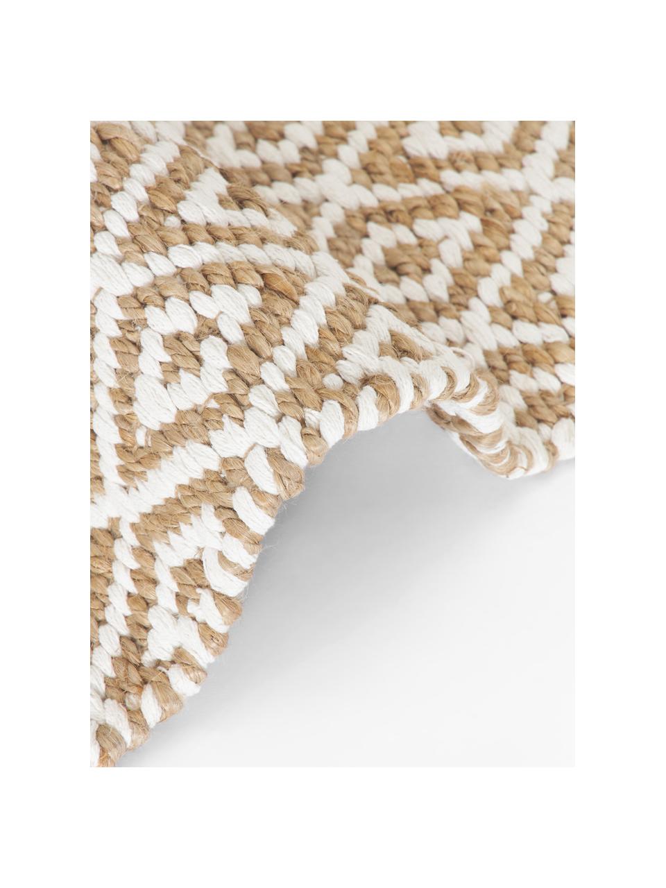Handgemaakte jute loper Ramos, 100% jute

Minstens 50% van het textiel dat in dit product wordt gebruikt, is gemaakt van jutevezels. Jutevezels zijn een snel hernieuwbare grondstof en kenmerken zich vooral door een laag waterverbruik tijdens de teelt en verwerking. Bovendien is het materiaal volledig biologisch afbreekbaar., Bruin, wit, B 80 x L 200 cm