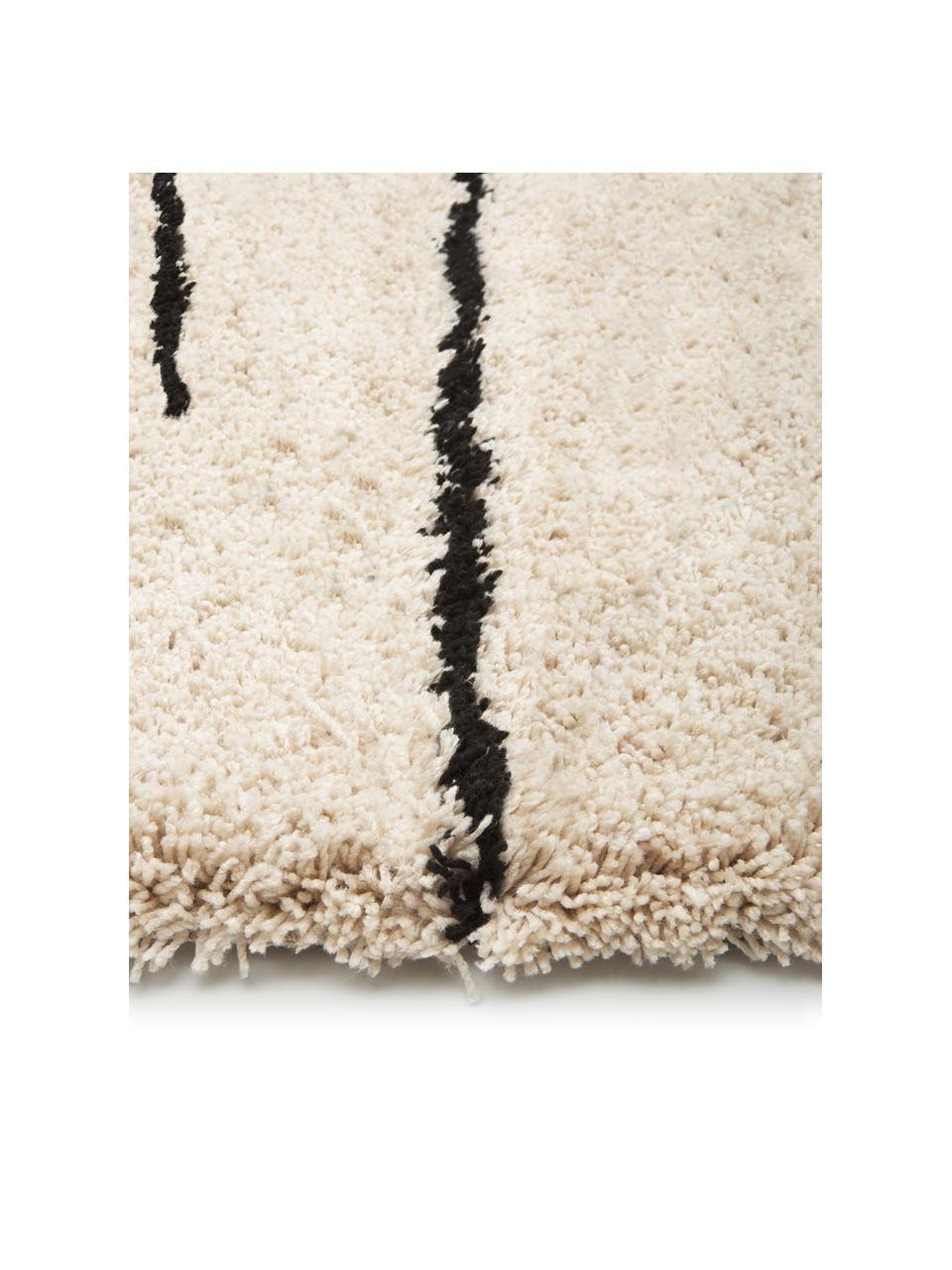 Pluizig hoogpolig vloerkleed Dunya, handgetuft, Bovenzijde: 100% polyester, Onderzijde: 100% katoen, Beige, zwart, B 300 x L 400 cm