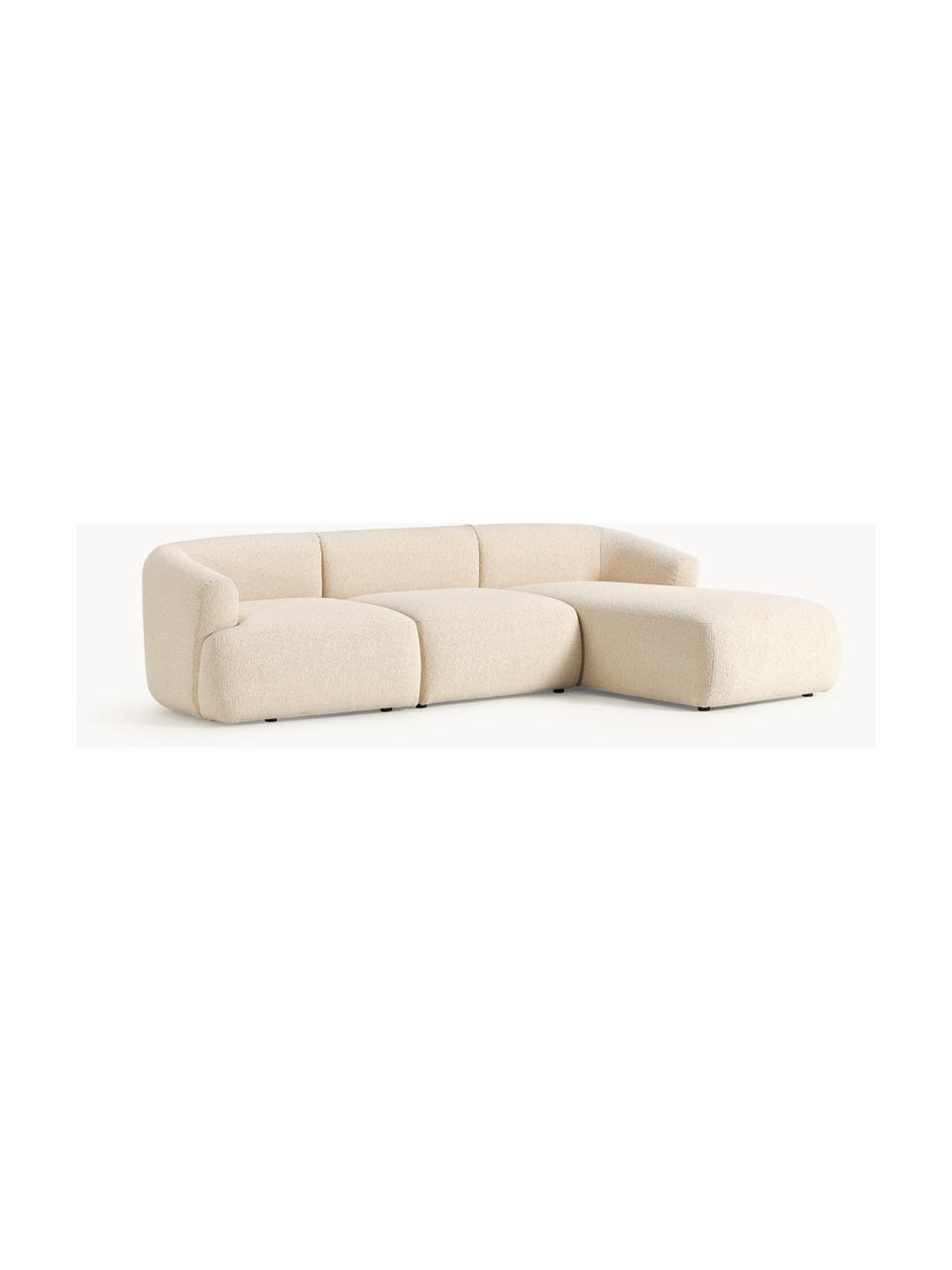 Divano angolare componibile 3 posti in bouclé Sofia, Rivestimento: bouclé (100% poliestere) , Struttura: legno di abete rosso, tru, Piedini: plastica Questo prodotto , Bouclé beige chiaro, Larg. 277 x Prof. 185 cm, chaise longue a destra