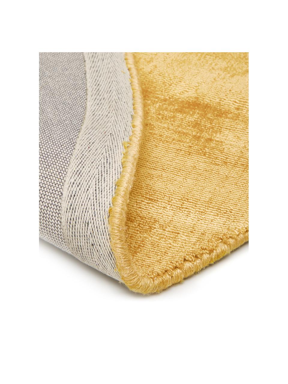 Rond viscose vloerkleed Jane, handgeweven, Onderzijde: 100% katoen Het in dit pr, Mosterdgeel, Ø 150 cm (maat M)