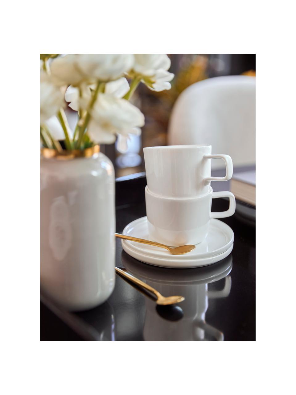 Tazas de café con platitos de porcelana Oco, 6 uds., Porcelana Fine Bone China (fina de hueso)
Fine Bone China es una pasta de porcelana fosfática que se caracteriza por su brillo radiante y translúcido., Blanco Off White, Ø 6 x Al 7 cm, 200 ml