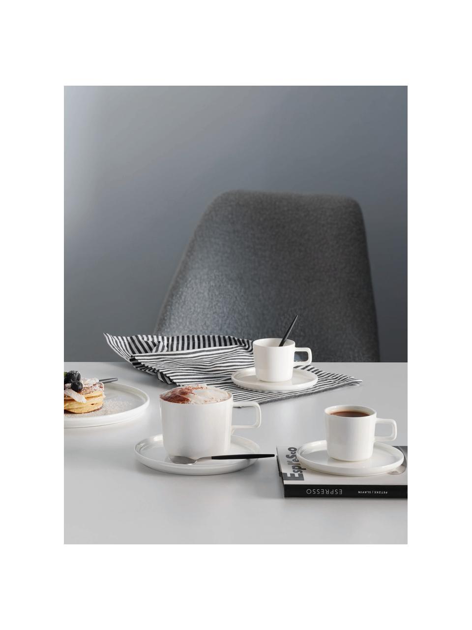 Tazas de café con platitos Oco, 6 uds., Porcelana Fine Bone China (fina de hueso)
Fine Bone China es una pasta de porcelana fosfática que se caracteriza por su brillo radiante y translúcido., Off White, Ø 6 x Al 7 cm, 200 ml