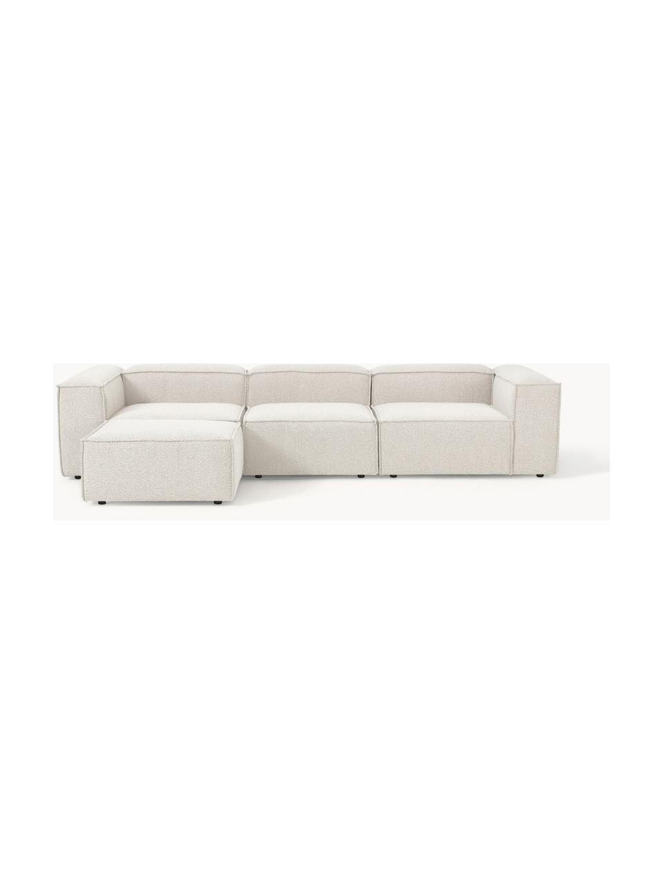 Modulares Sofa Lennon (4-Sitzer) aus Bouclé mit Hocker (links/rechts), Bezug: Bouclé (100 % Polyester) , Gestell: Massives Kiefernholz, Spe, Füße: Kunststoff Dieses Produkt, Bouclé Off White, B 329 x T 207 cm