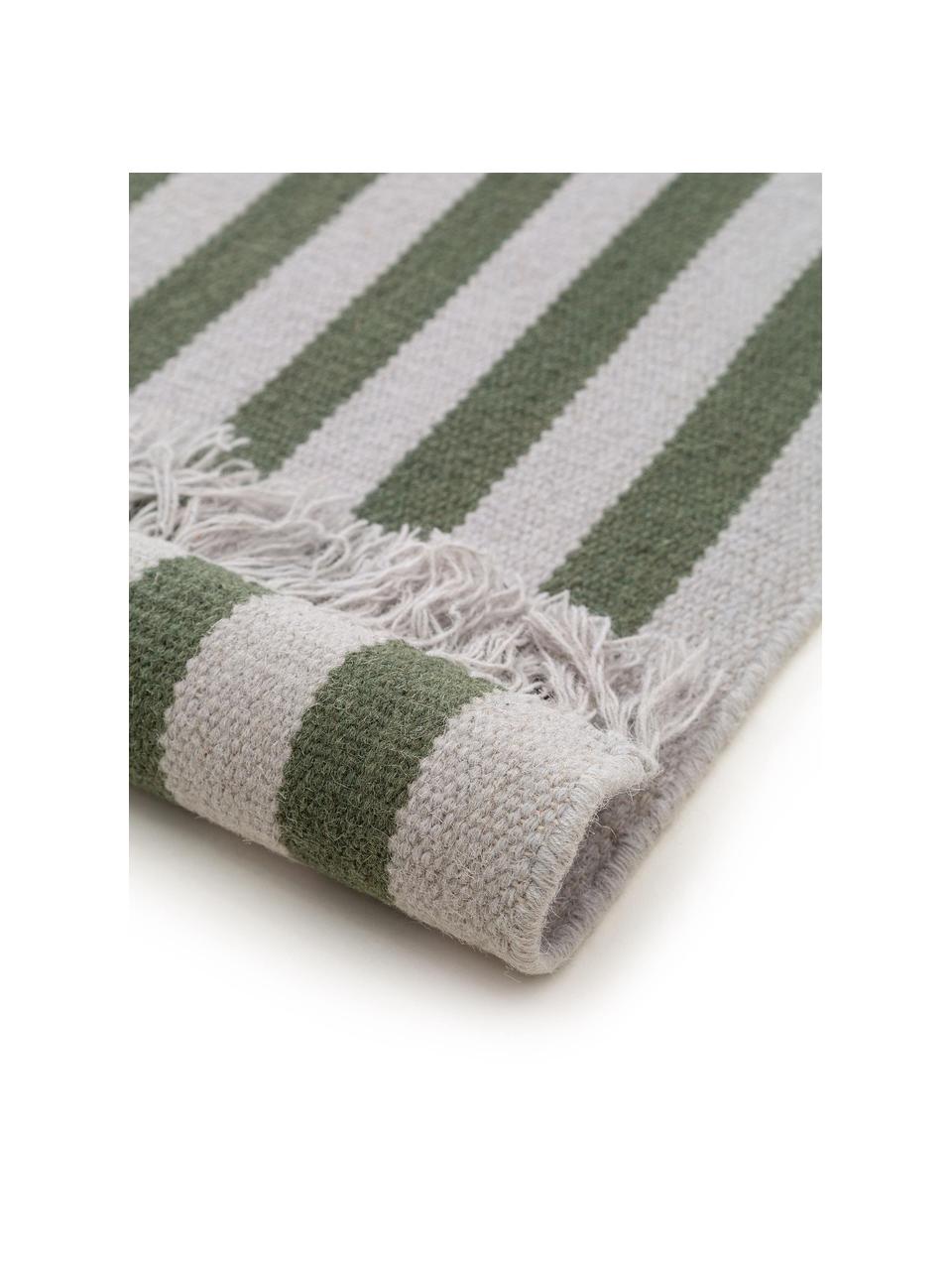 Ręcznie tkany chodnik z wełny z frędzlami Gitta, 90% wełna, 10% bawełna

Włókna dywanów wełnianych mogą nieznacznie rozluźniać się w pierwszych tygodniach użytkowania, co ustępuje po pewnym czasie, Jasny szary, ciemny zielony, S 70 x D 200 cm