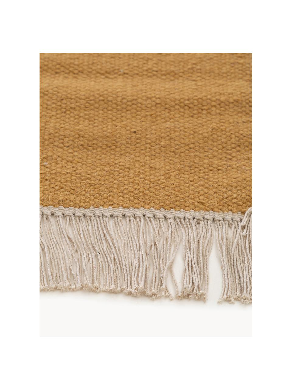 Tapis en laine tissé à la main avec franges Liv, 80 % laine, 20 % coton

Les tapis en laine peuvent perdre des fibres lors des premières semaines et des peluches peuvent se former, ce phénomène est naturel et diminue à mesure de votre usage et du temps, Brun clair, larg. 80 x long. 150 cm (taille XS)