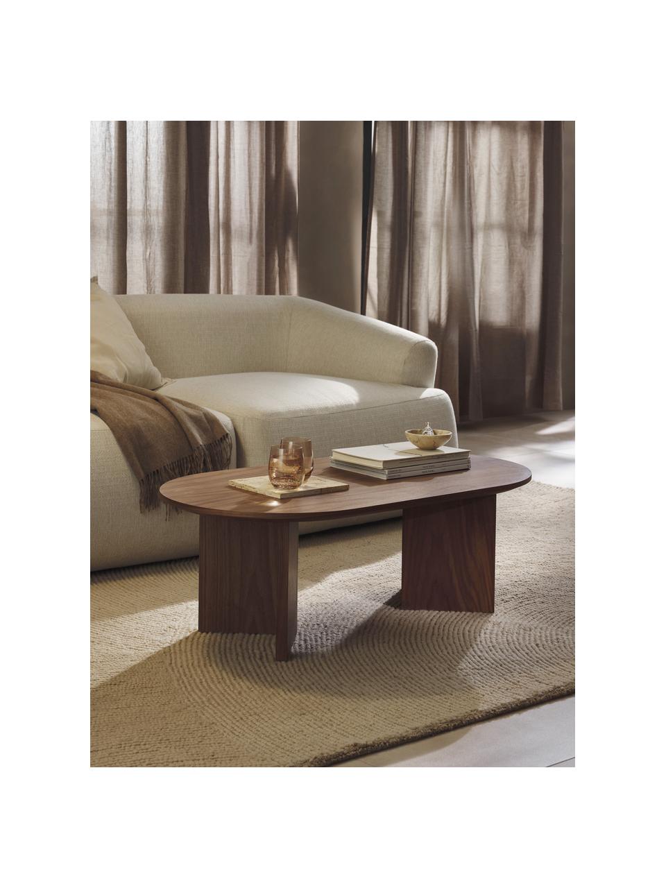 Oválný dřevěný konferenční stolek Toni, Dřevovláknitá deska střední hustoty (MDF) s lakovaná dýha z ořechového dřeva

Tento produkt je vyroben z udržitelných zdrojů dřeva s certifikací FSC®., Ořechové dřevo, Š 100 cm, H 55 cm