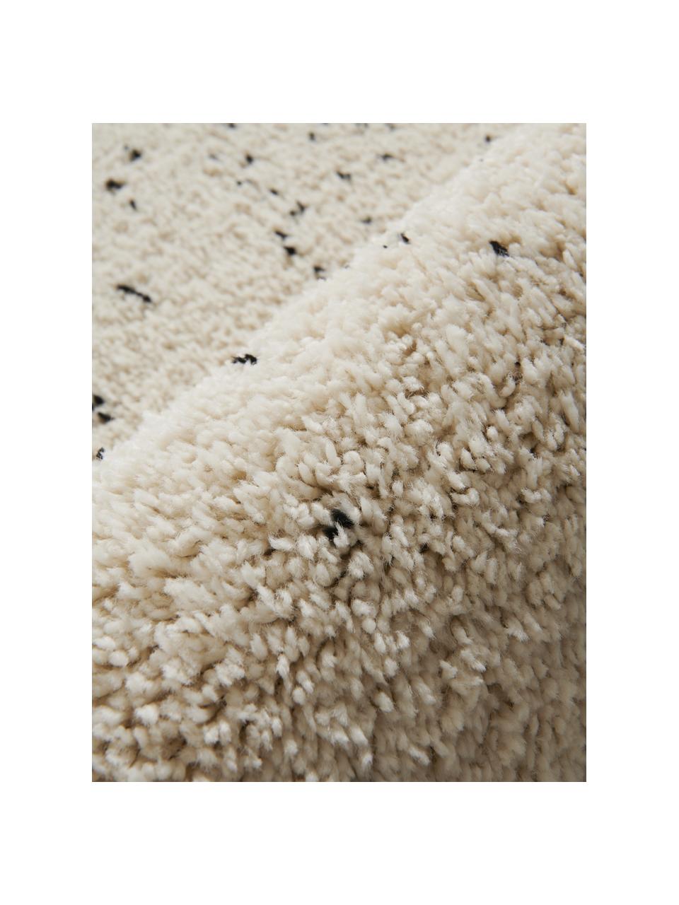 Kulatý koberec s vysokým vlasem Ludde, lehce skvrnitý, Tlumeně bílá, černá