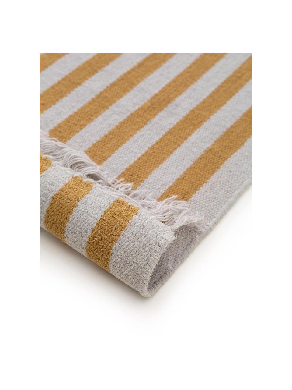 Ręcznie tkany chodnik z wełny z frędzlami Gitta, 90% wełna, 10% bawełna

Włókna dywanów wełnianych mogą nieznacznie rozluźniać się w pierwszych tygodniach użytkowania, co ustępuje po pewnym czasie, Jasny szary, słoneczny żółty, S 70 x D 200 cm