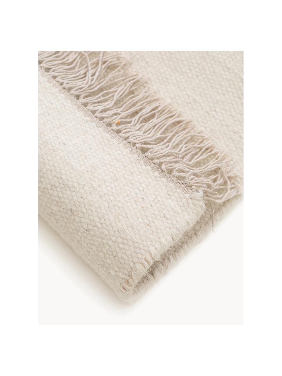 Tapis en laine tissé à la main avec franges Liv, 80 % laine, 20 % coton

Les tapis en laine peuvent perdre des fibres lors des premières semaines et des peluches peuvent se former, ce phénomène est naturel et diminue à mesure de votre usage et du temps, Beige clair, larg. 80 x long. 150 cm (taille XS)
