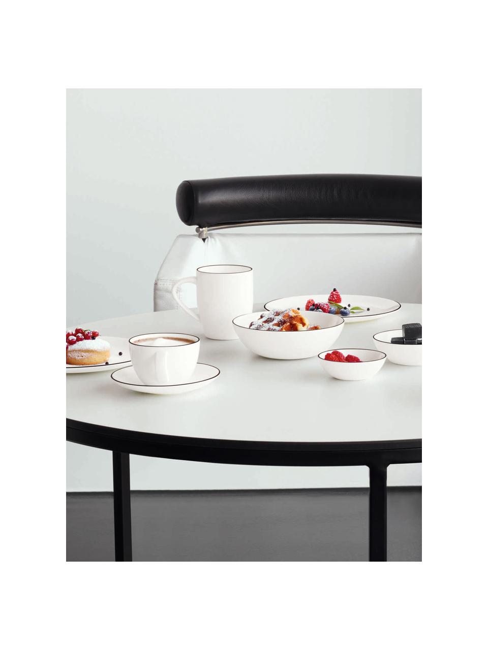 Piatto piano con bordo nero á table ligne noir 4 pz, Porcellana Fine Bone China
Fine Bone China è una porcellana delicata che si distingue particolarmente per la sua lucentezza radiosa., Bianco Bordo: nero, Ø 27 cm