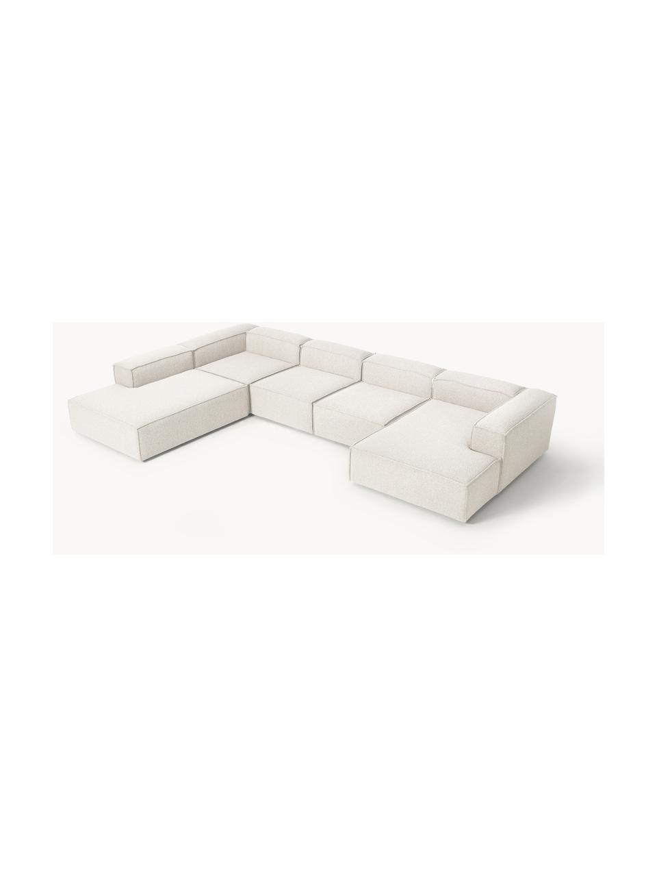 Divano ampio componibile in bouclé Lennon, Rivestimento: bouclé (100% poliestere) , Struttura: legno di pino massiccio, , Piedini: plastica Questo prodotto , Bouclè bianco latte, Larg. 418 x Prof. 269 cm, chaise longue a sinistra