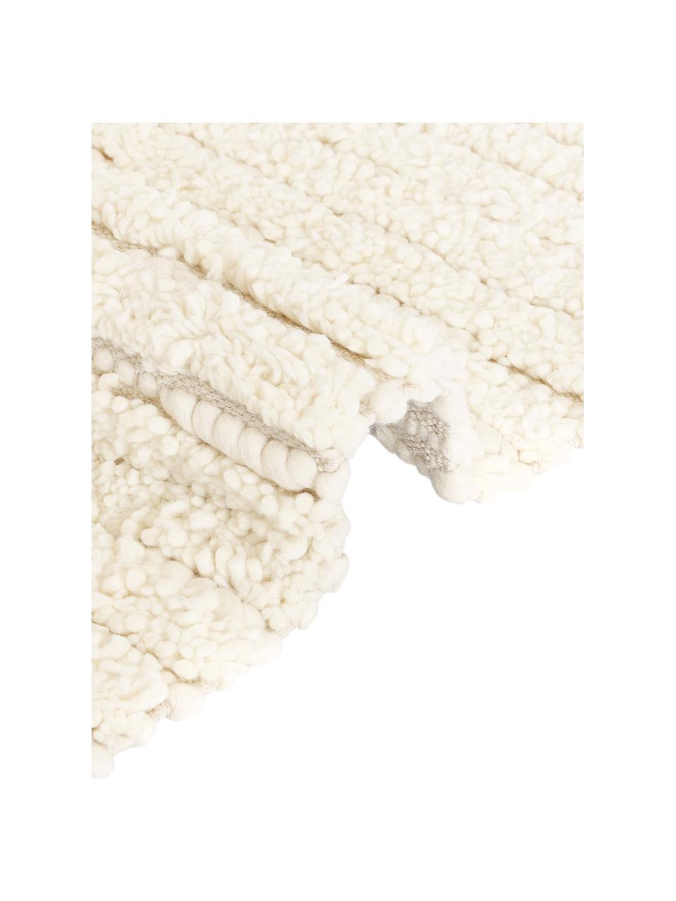Handgewebter Hochflor-Wollteppich Octavia mit Hoch-Tief-Struktur, 71 % Wolle, 29 % Baumwolle
 
Bei Wollteppichen können sich in den ersten Wochen der Nutzung Fasern lösen, dies reduziert sich durch den täglichen Gebrauch und die Flusenbildung geht zurück., Cremeweiß, B 80 x L 150 cm (Größe XS)