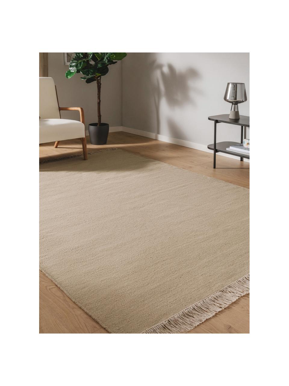 Tapis en laine tissé à la main avec franges Liv, 80 % laine, 20 % coton

Les tapis en laine peuvent perdre des fibres lors des premières semaines et des peluches peuvent se former, ce phénomène est naturel et diminue à mesure de votre usage et du temps, Beige, larg. 80 x long. 150 cm (taille XS)