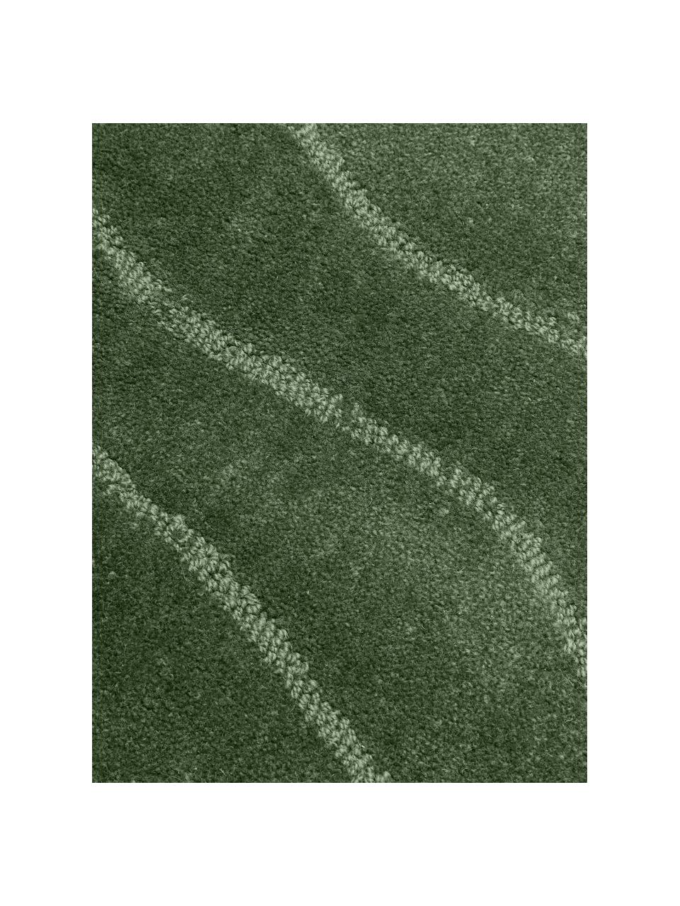Alfombra artesanal redonda de lana Aaron, Parte superior: 100% lana, Reverso: 100% algodón Las alfombra, Verde oscuro, Ø 120 cm (Tamaño S)
